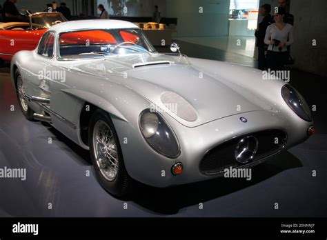 Mercedes-Benz 300 SLR Coupé, a sleek silver race car with gullwing ...