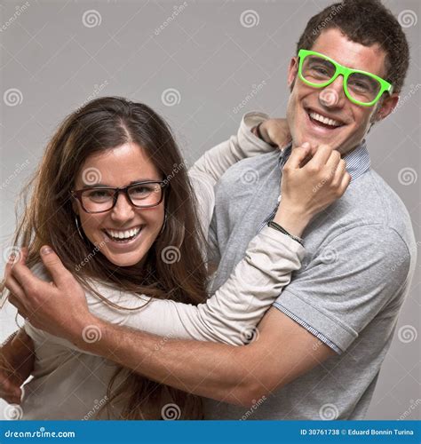 Portrait of a Beautiful Young Happy Smiling Couple with Glasses Stock ...