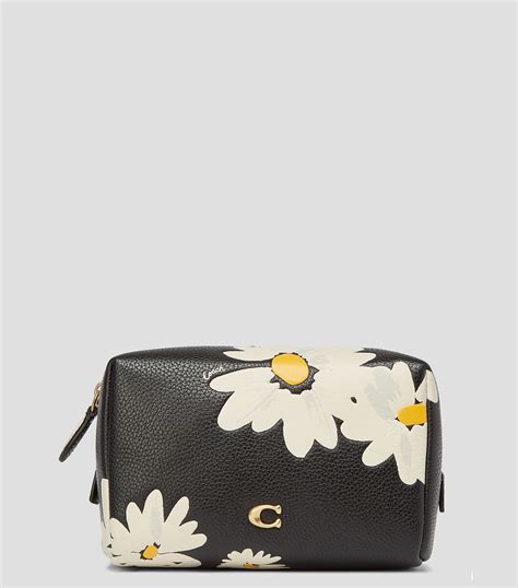 COACH: Cosmetiquera Floral Mujer | El Palacio de Hierro