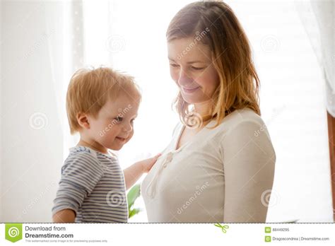 Beautiful Mother Playing with Her Son at Kitchen Stock Image - Image of ...