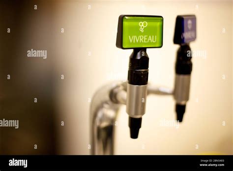 Vivreau water tap dispensing hot and cold water Stock Photo - Alamy