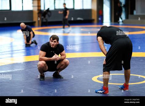 French wrestler Akhmed Aibuev, left, during a training session at the ...