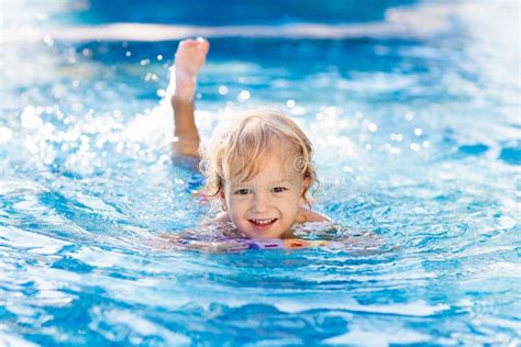 Kids in Swimming Pool. Children Swim. Family Fun Stock Photo - Image of ...