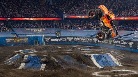 Watch monster trucks performing airborne stunts in Singapore at Monster ...