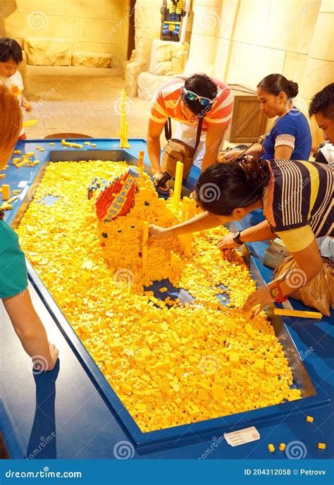 UAE, DUBAI - JULY 16, 2018: Group of Adults Playing Lego Editorial ...