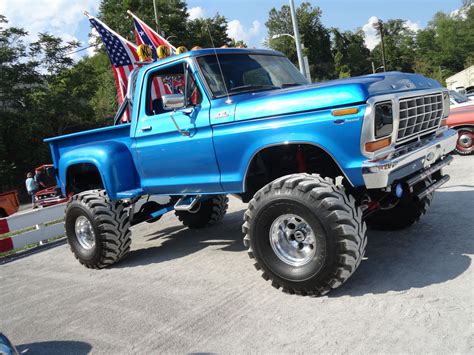 Lifted Ford 4x4 Truck with American Flags