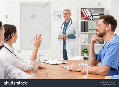 Doctor Giving Lecture Near Flipchart Conference Stock Photo 2239580535 ...