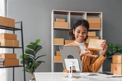 Beautiful African Americans Woman Live Streaming at Her Shop. Business ...