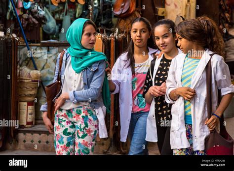 Fes, Morocco. Young Women in Modern Moroccan Dress Styles Walking in ...