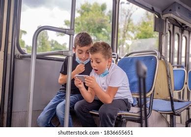 Two Boys Sitting City Bus Playing Stock Photo 1836655651 | Shutterstock