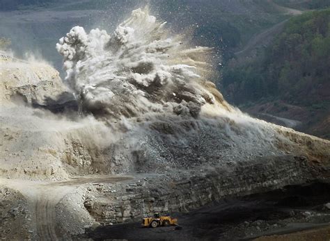 Mountain top destruction An explosive is detonated at an A Coal Corp ...