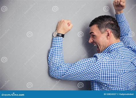 Angry man hitting wall stock image. Image of anger, person - 53824537