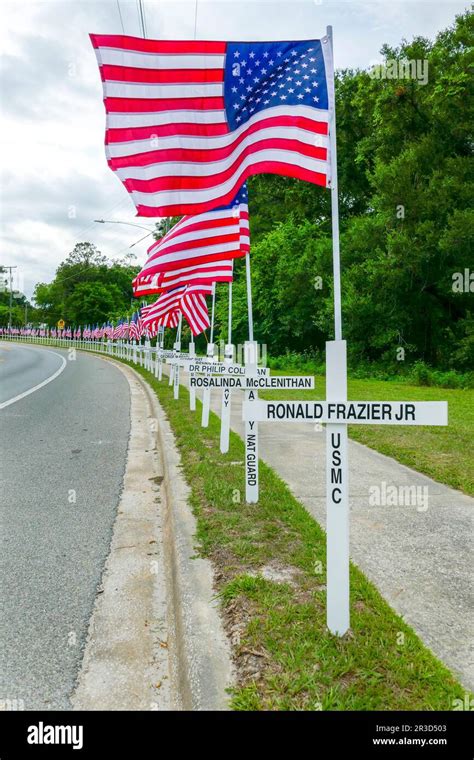 American flags and crosses celebrate the memory of those who have ...