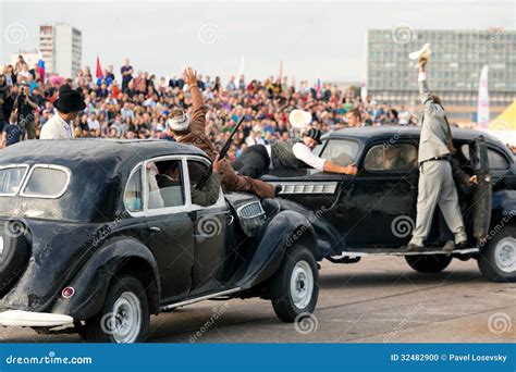 Stuntmen Depict a Gunfight on Old Cars Editorial Image - Image of cool ...