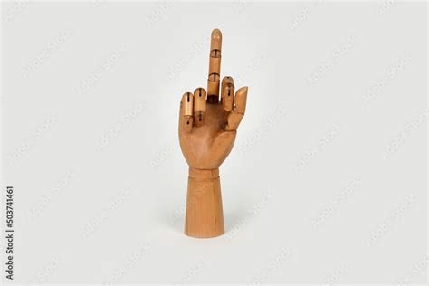 Main en bois - doigt d'honneur Stock Photo | Adobe Stock