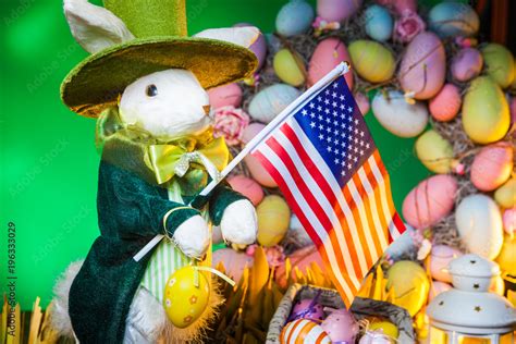 The Feast of Easter. Rabbit with colorful eggs. Easter holiday in the ...