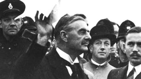 Chamberlain returns from Munich