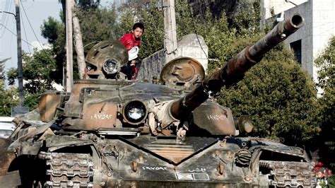 Syrian rebels use captured tank, attack military air base in Aleppo ...