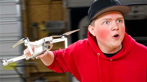 PSYCHO FAN SMASHES DRONE