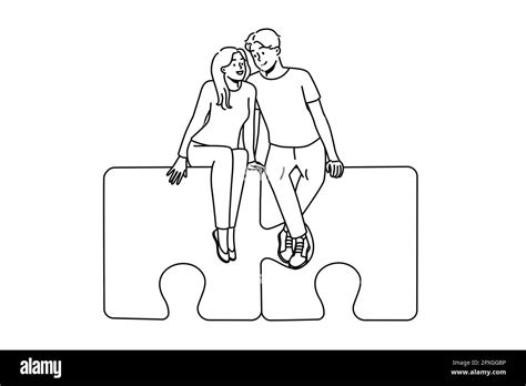 Happy couple sitting on jigsaw puzzles hugging. Smiling man and woman ...