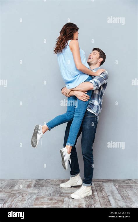 Man lifting up girlfriend isolated hi-res stock photography and images ...