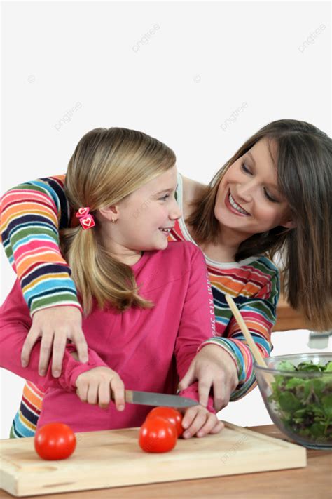 Maternal Guidance In Culinary Skills As A Daughter Learns To Cook ...