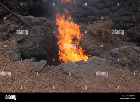 Fire in a hole Stock Photo - Alamy
