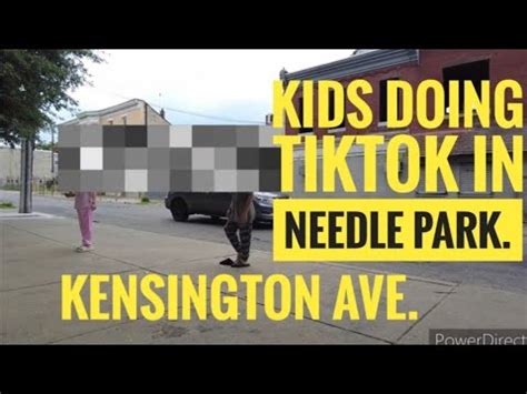 9 YEAR OLDS WALKING THROUGH NEEDLE PARK ON KENSINGTON AVE WITH SANDALS ...