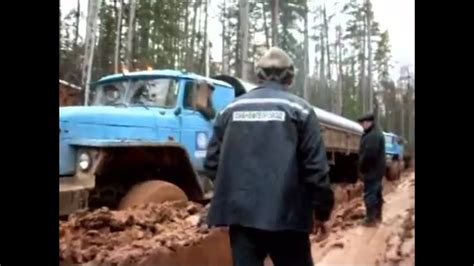 Russian Semi Truck Gets Pulled Out of Mud - YouTube