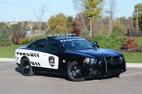 What It's Like to Drive a Police Car | Cars.com