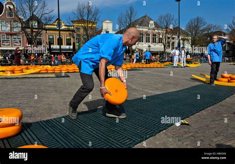 Rolling wheel of cheese hi-res stock photography and images - Alamy