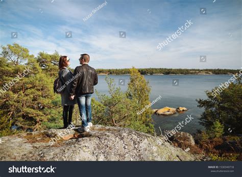 Man Woman Standing Together On Rock Stock Photo 1530340718 | Shutterstock
