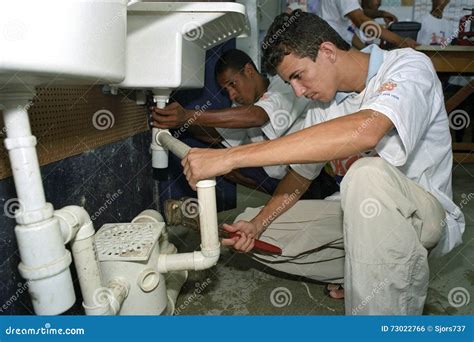 Latino Teens Learn Profession Plumbing, Trade School Editorial Photo ...