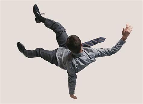 Young businessman in the air, falling down | Pose reference, Person ...