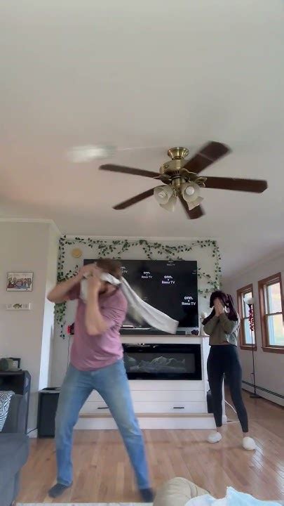 Couple’s Water Bottle Ceiling Fan Game Goes Hilariously Wrong - YouTube