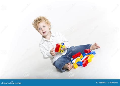 Cute Toddler is Building with Legos Stock Image - Image of explore ...