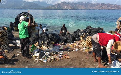 Indonesian Men are Cleaning the Rubbish on Gili Air Island Indonesia ...