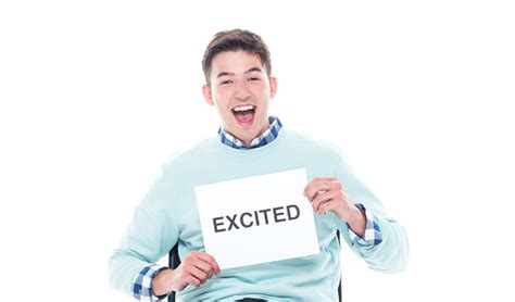 Handsome Young Man Sitting And Feeling Excited Stock Photo - Download ...