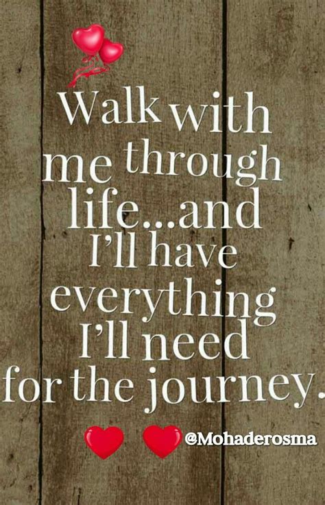 a wooden fence with two hearts and the words walk with me through life ...