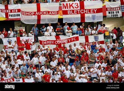 England Football fans with their flags in the stands at the 2006 Stock ...
