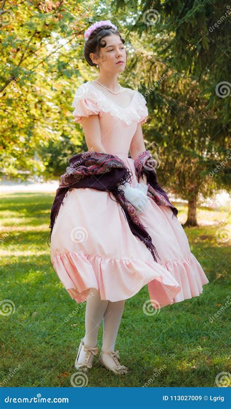 Romantic Girl in an Evening Dress Keep a Shawl Hands Standing in Stock ...