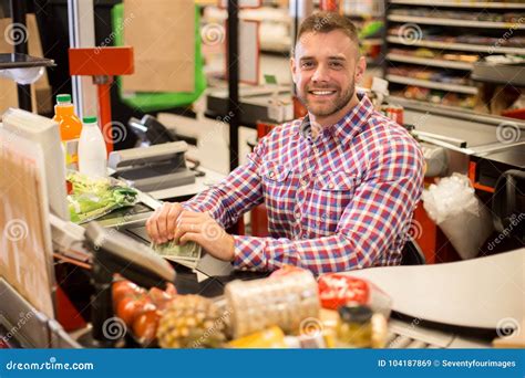 Handsome Young Cashier Working in Supermarket Stock Image - Image of ...