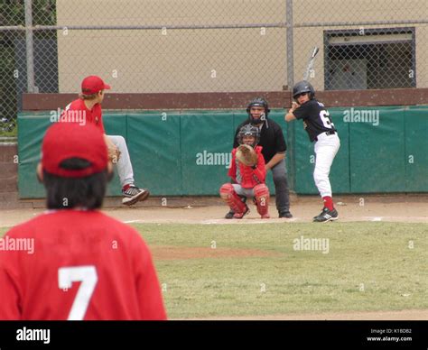 The moment of baseball game. Pitcher is throwing the ball. Catcher and ...