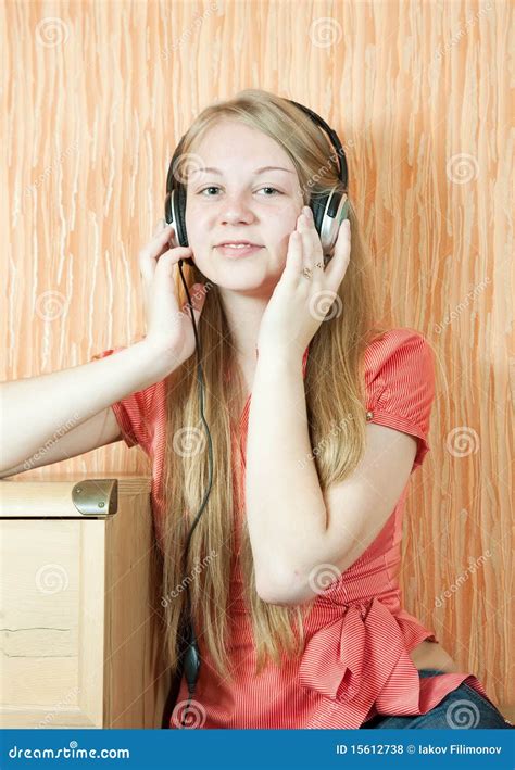 Girl listening music stock photo. Image of livingroom - 15612738
