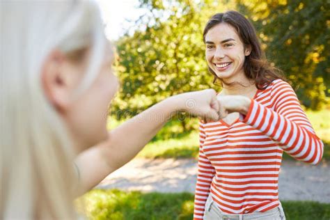 Two Friends Having a Cool Fist Bump Stock Image - Image of hand ...