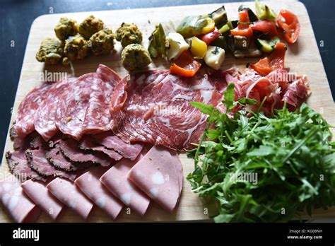 Sharing platter of cold meats and vegetables at a wedding Stock Photo ...
