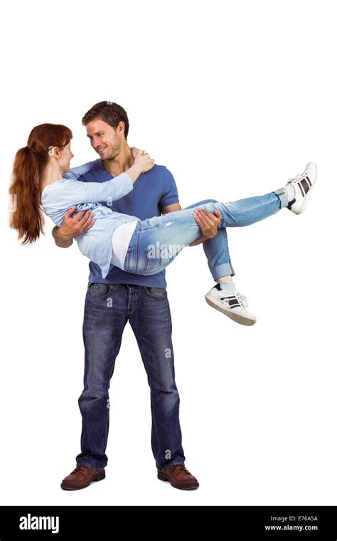 Man lifting up his girlfriend Stock Photo - Alamy