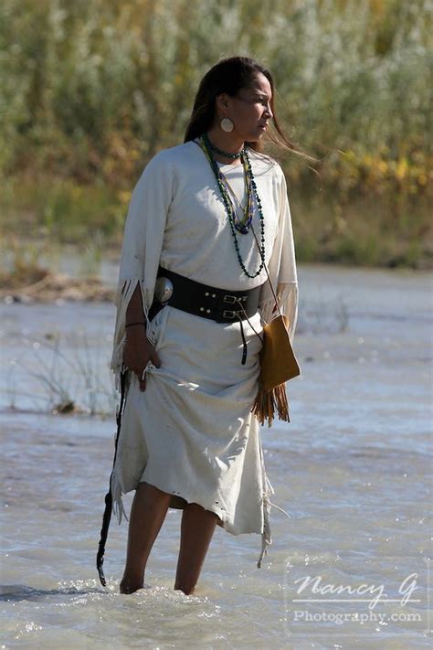 A Native American Indian Women Standing In A South Dakota River Nancy G