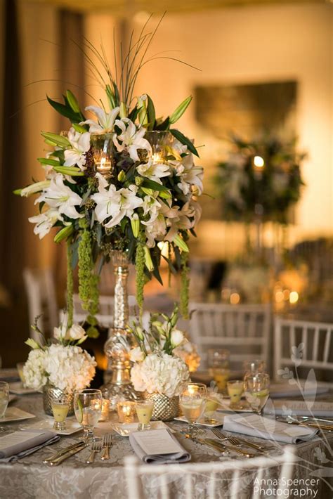 White Lily Floral Arrangements At A Wedding Reception