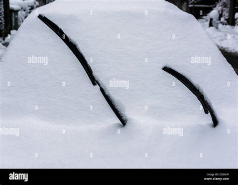 Zurich Switzerland 29th Dec 2014 A Snow Covered Car On A Street In